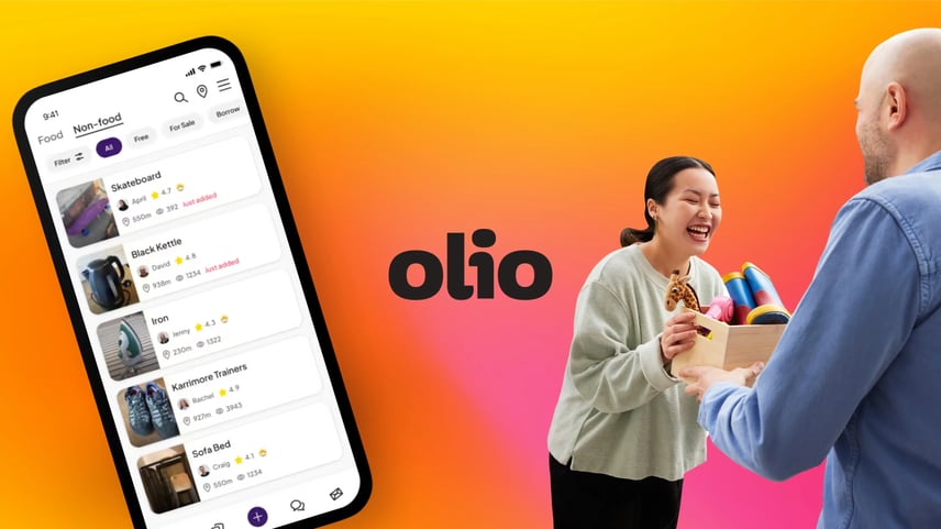 A smartphone screen displaying the Olio app interface with a list of non-food items such as a skateboard, black kettle, iron, trainers, and sofa bed, each showing distance, user name, and ratings. The background features a vibrant gradient of orange, pink, and yellow with the Olio logo in bold black letters. Two people are exchanging a wooden box filled with colorful household items.